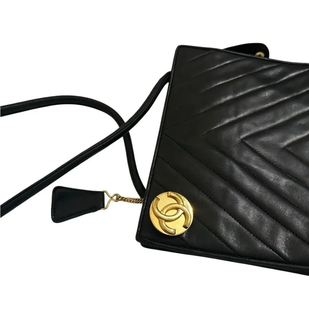 CHANEL Black Chevron Leather Shoulder Bag with Gold Accent